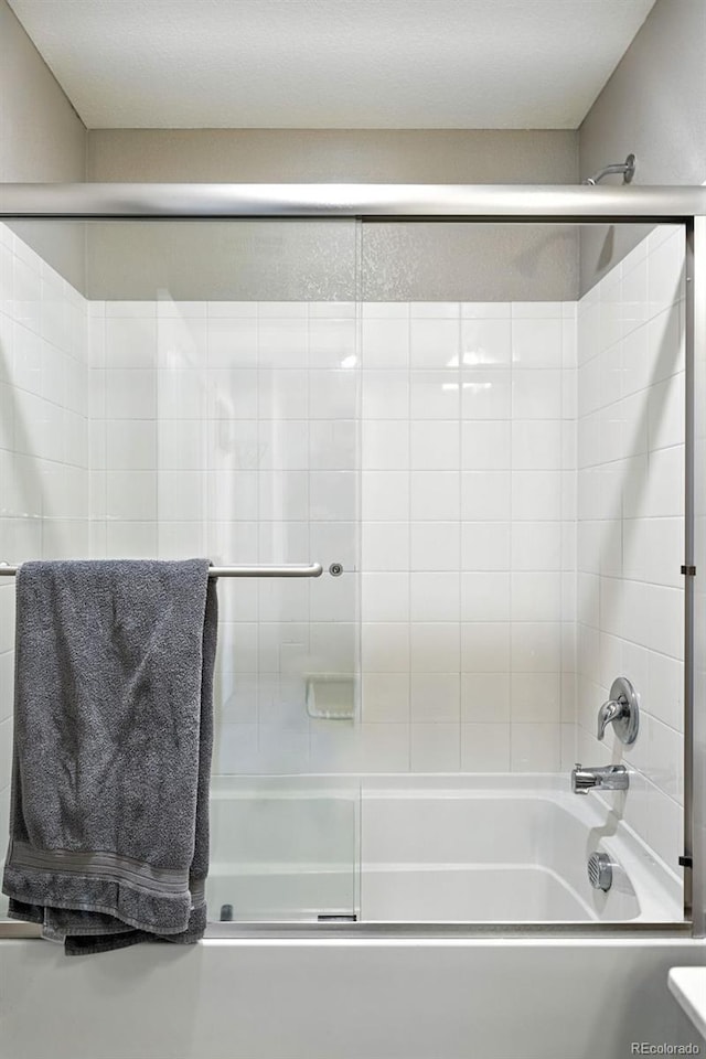 1670 Vantage Pkwy, Berthoud, CO 80513 - bathroom featuring enclosed tub / shower combo