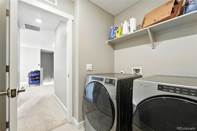 1670 Vantage Pkwy, Berthoud, CO 80513 - washroom with separate washer and dryer, carpet flooring, and a textured wall