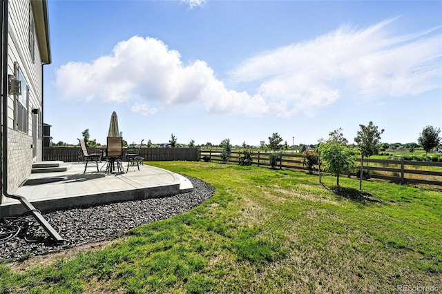 1670 Vantage Pkwy, Berthoud, CO 80513 - fenced backyard with a patio area