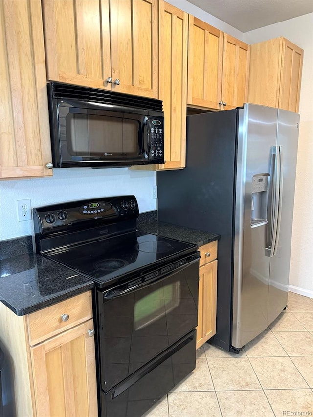 17346 Nature Walk Trl Unit 105, Parker, CO 80134 - kitchen with black appliances, light tile patterned floors, dark stone counters, and baseboards