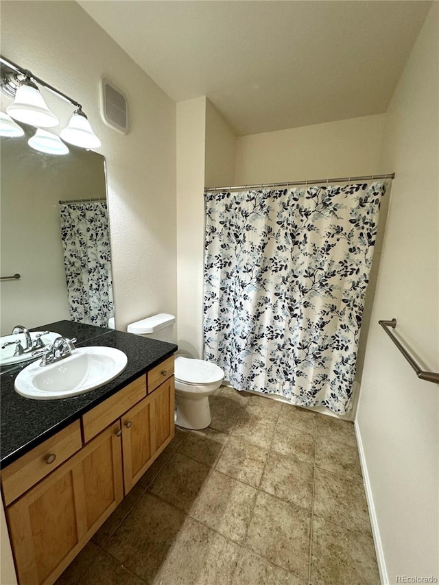 17346 Nature Walk Trl Unit 105, Parker, CO 80134 - full bathroom featuring vanity, toilet, and curtained shower