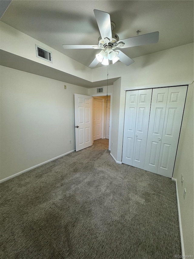 17346 Nature Walk Trl Unit 105, Parker, CO 80134 - unfurnished bedroom featuring carpet flooring, baseboards, a closet, and ceiling fan