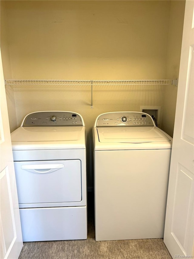17346 Nature Walk Trl Unit 105, Parker, CO 80134 - laundry area featuring washing machine and dryer