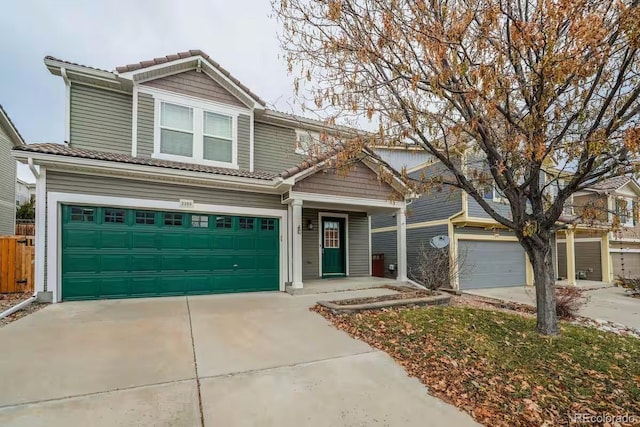 view of front of property with a garage