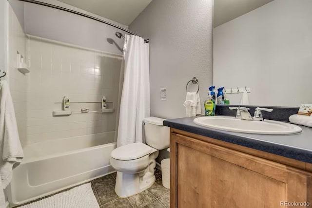 full bathroom featuring shower / tub combo with curtain, vanity, tile patterned flooring, and toilet