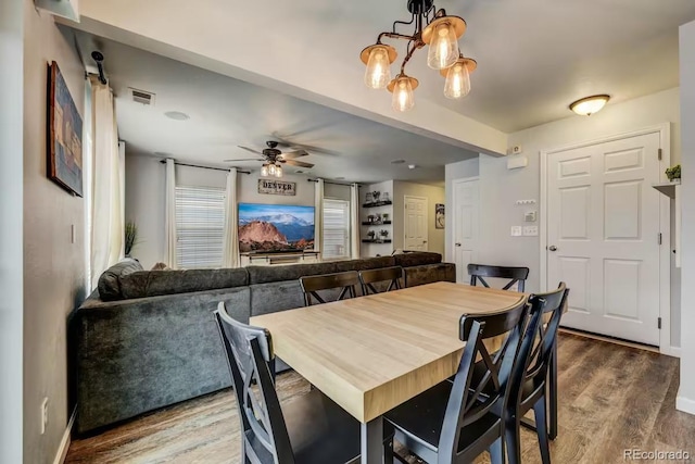 dining area featuring hardwood / wood-style flooring and ceiling fan