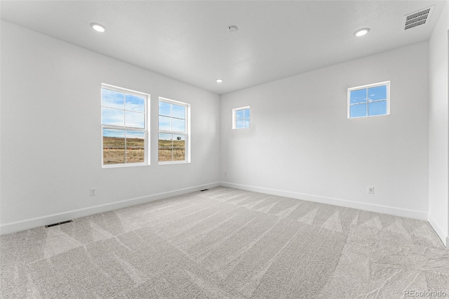 view of carpeted spare room