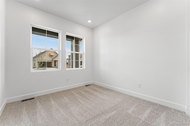 view of carpeted spare room