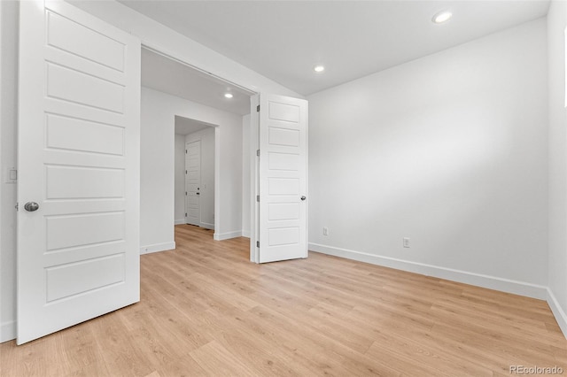 unfurnished bedroom featuring light hardwood / wood-style flooring