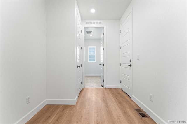 hallway featuring light hardwood / wood-style flooring