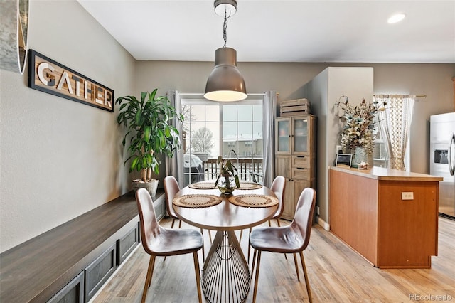 997 Burning Bush Pt, Monument, CO 80132 - dining area featuring light wood-style floors