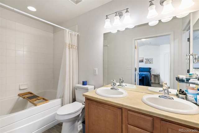 997 Burning Bush Pt, Monument, CO 80132 - ensuite bathroom with shower / bath combo, double vanity, and toilet