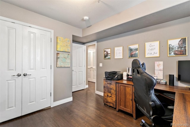 997 Burning Bush Pt, Monument, CO 80132 - home office featuring dark wood-type flooring and baseboards