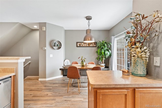 997 Burning Bush Pt, Monument, CO 80132 - dining area with light wood-style floors, recessed lighting, and baseboards