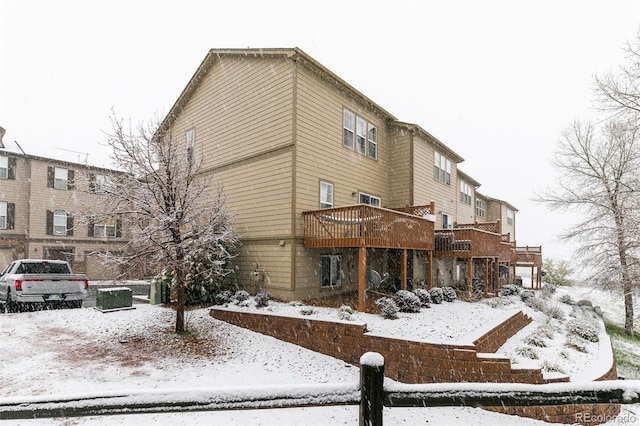 997 Burning Bush Pt, Monument, CO 80132 - snow covered property with a deck