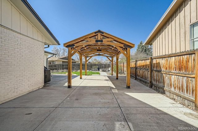 view of patio / terrace featuring a gazebo and a fenced backyard