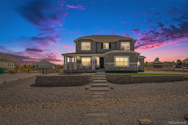 4532 Dewey Ln, Brighton, CO 80603 - view of front of house with covered porch and stone siding