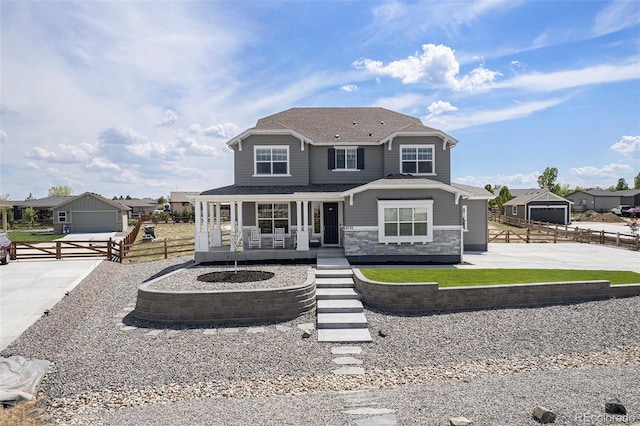 4532 Dewey Ln, Brighton, CO 80603 - view of front of home with covered porch and stone siding