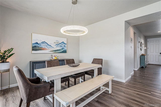 4532 Dewey Ln, Brighton, CO 80603 - dining area featuring baseboards and wood finished floors