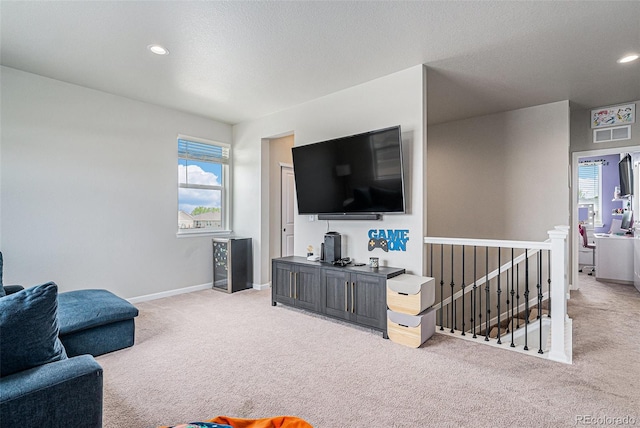 4532 Dewey Ln, Brighton, CO 80603 - living room featuring carpet, baseboards, and recessed lighting