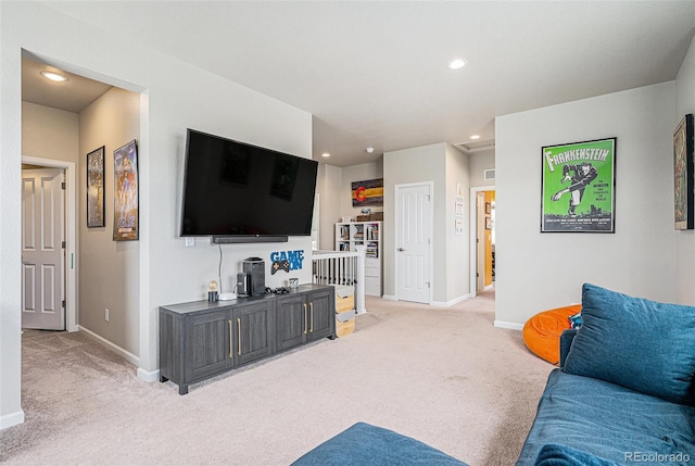 4532 Dewey Ln, Brighton, CO 80603 - living area featuring light carpet, baseboards, and recessed lighting