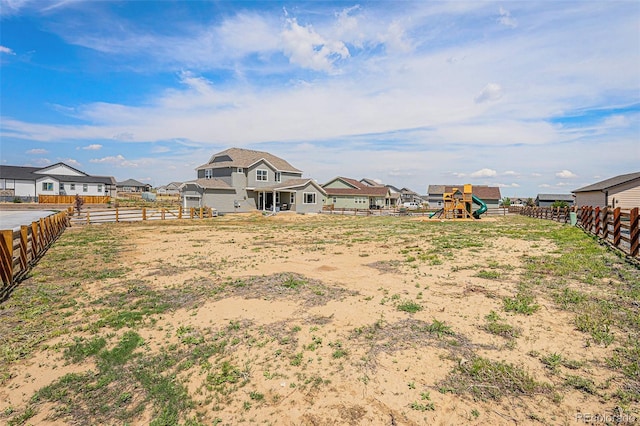 4532 Dewey Ln, Brighton, CO 80603 - view of yard featuring a playground and a residential view