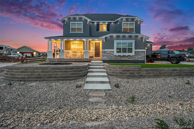 4532 Dewey Ln, Brighton, CO 80603 - view of front of house with stone siding and covered porch