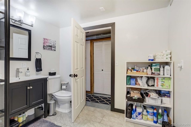 351 Badger Cir, Guffey, CO 80820 - bathroom featuring a closet, vanity, and tile patterned floors