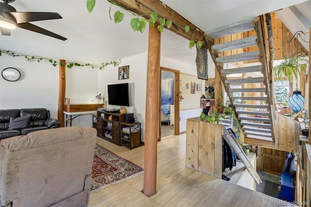 351 Badger Cir, Guffey, CO 80820 - living area with a ceiling fan, light wood-type flooring, and stairway