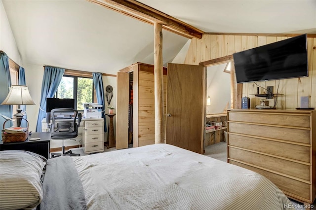 351 Badger Cir, Guffey, CO 80820 - bedroom with wooden walls and carpet