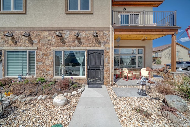 121 Halleys Ave Unit D, Poncha Springs, CO 81242 - entrance to property with stucco siding and a balcony