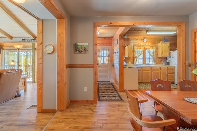 1348 Gcr 64, Grand Lake, CO 80447 - corridor featuring light wood finished floors, a sink, plenty of natural light, and baseboards