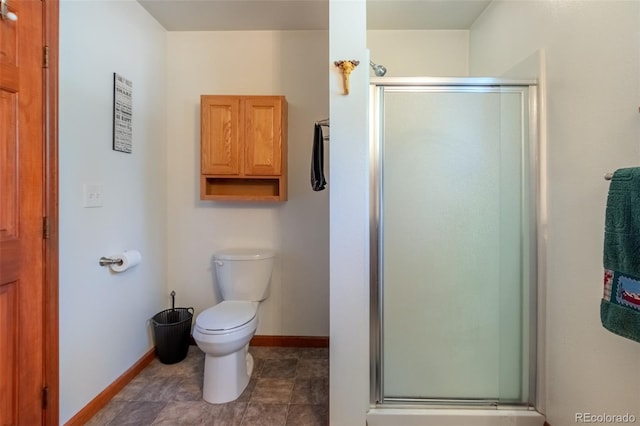 1348 Gcr 64, Grand Lake, CO 80447 - full bathroom with a stall shower, baseboards, and toilet