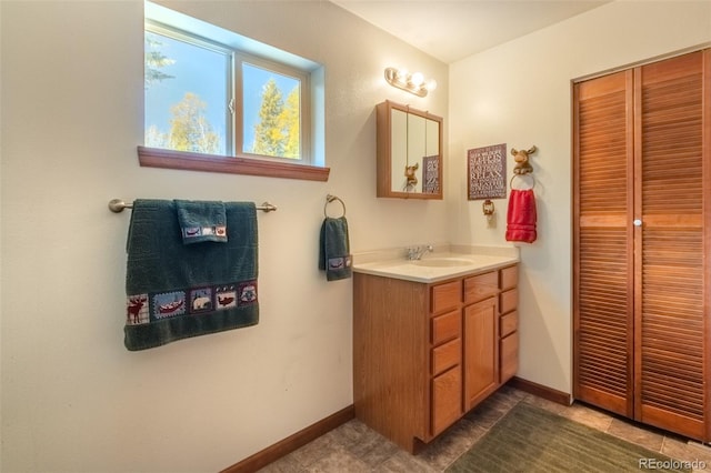 1348 Gcr 64, Grand Lake, CO 80447 - bathroom with vanity, baseboards, and tile patterned flooring