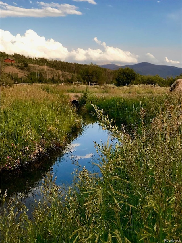 1348 Gcr 64, Grand Lake, CO 80447 - water view featuring mountains