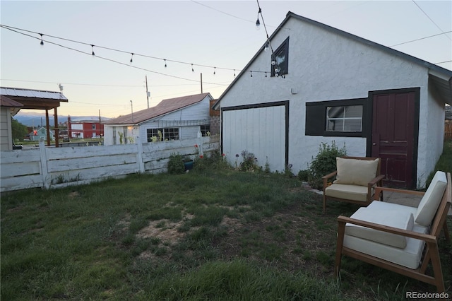 view of yard featuring fence