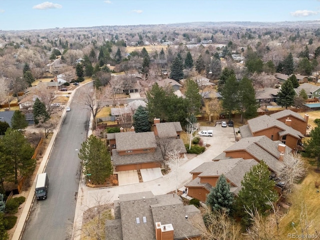 birds eye view of property with a residential view