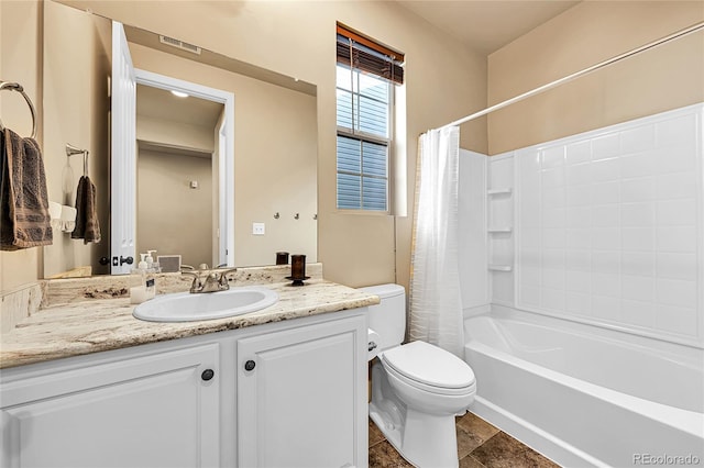 full bath featuring shower / bath combo with shower curtain, visible vents, toilet, and vanity