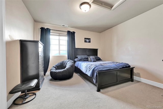 bedroom featuring visible vents, baseboards, and carpet floors