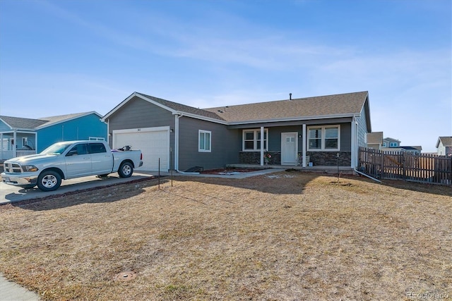 ranch-style home featuring a garage