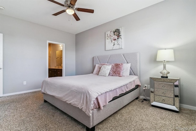 carpeted bedroom with ceiling fan and ensuite bathroom