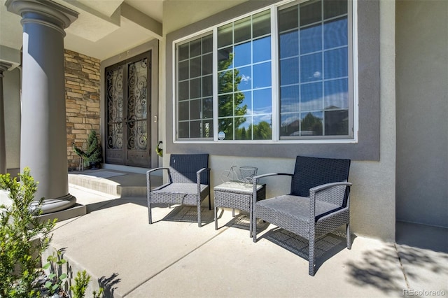 24031 E Hinsdale Pl, Aurora, CO 80016 - covered porch with french doors