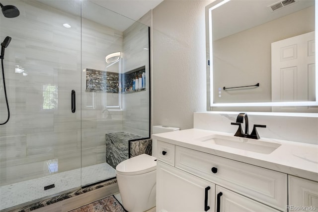 24031 E Hinsdale Pl, Aurora, CO 80016 - full bath featuring toilet, a shower stall, and vanity