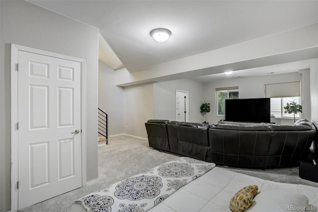 24031 E Hinsdale Pl, Aurora, CO 80016 - carpeted living area featuring stairway and baseboards
