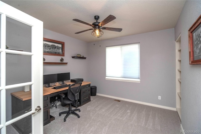 14962 Williams St, Thornton, CO 80602 - office area with a ceiling fan, light carpet, baseboards, and a textured ceiling