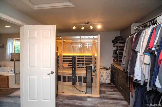 14962 Williams St, Thornton, CO 80602 - spacious closet featuring dark wood-style floors