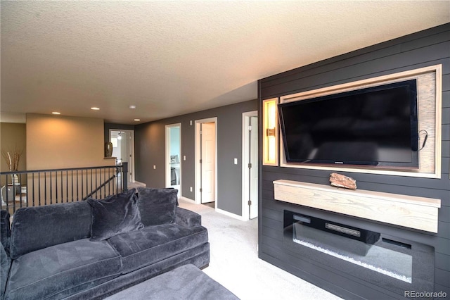 14962 Williams St, Thornton, CO 80602 - living room featuring light carpet, baseboards, a textured ceiling, and recessed lighting