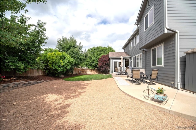 14962 Williams St, Thornton, CO 80602 - fenced backyard featuring a patio area