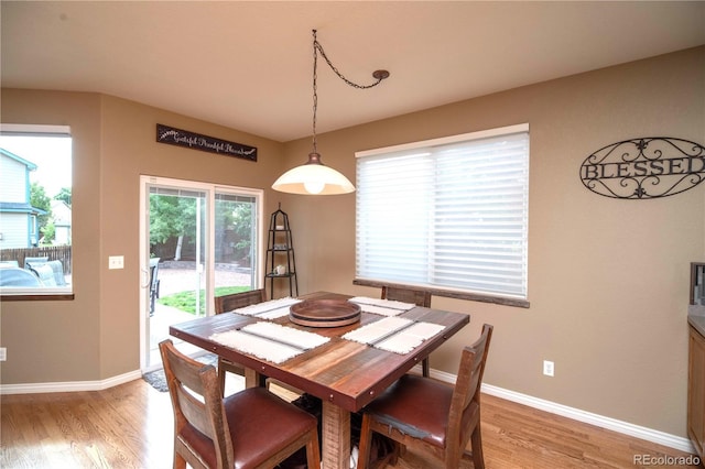 14962 Williams St, Thornton, CO 80602 - dining room featuring light wood-style floors and baseboards