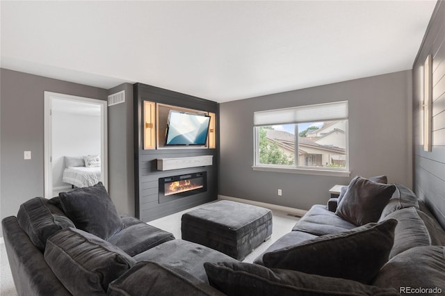 14962 Williams St, Thornton, CO 80602 - carpeted living room featuring a fireplace and baseboards